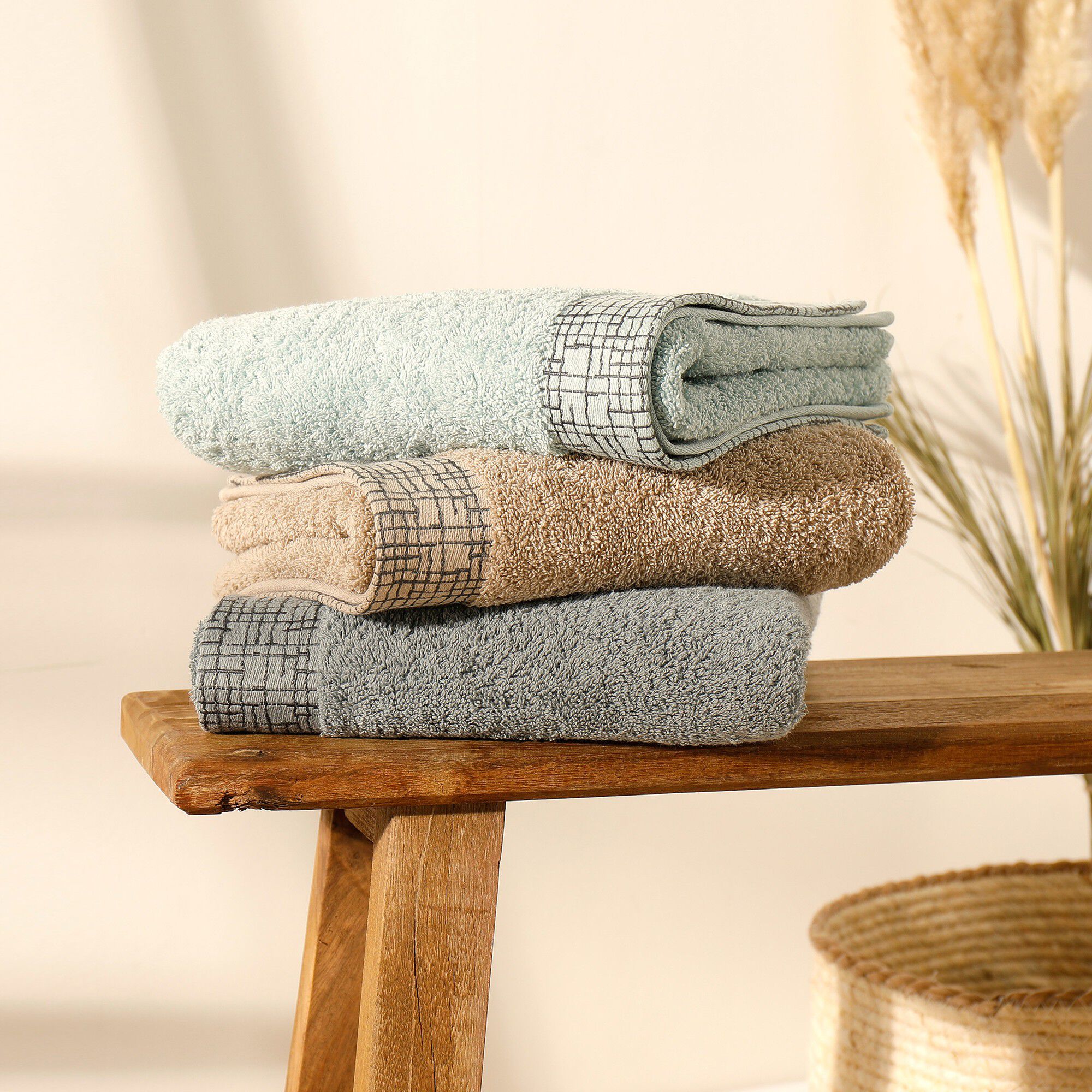 Serviette éponge liteau jacquard quadrillé