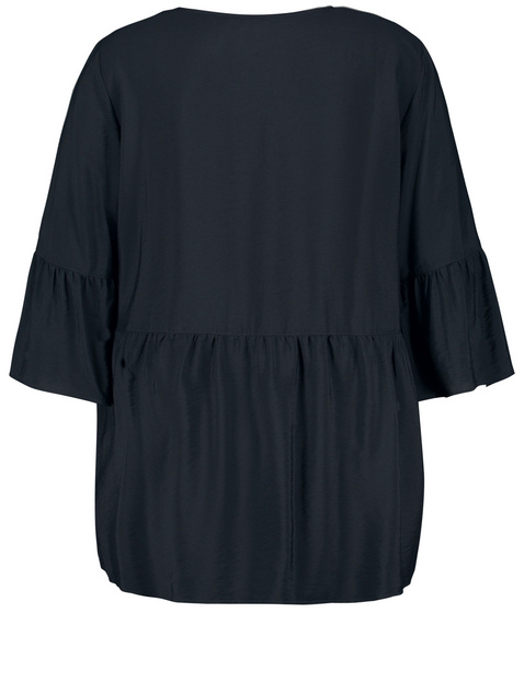 Ausgestellte Bluse mit Volants
