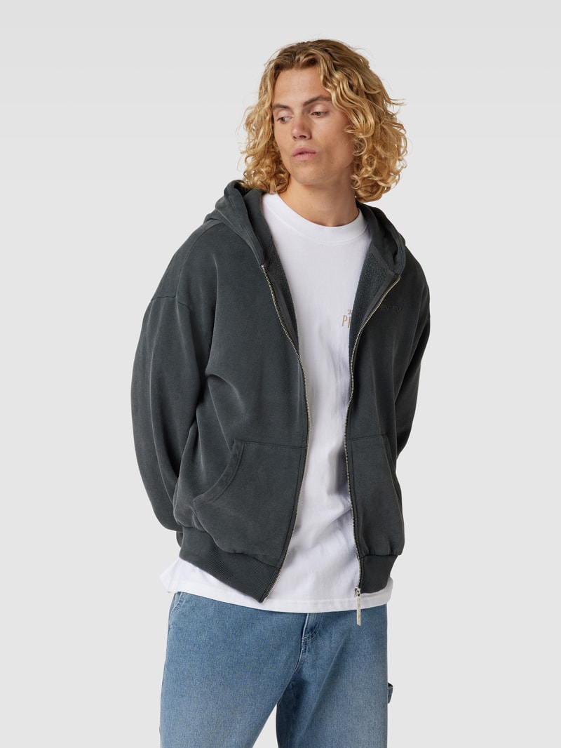 Sweatjacke mit Känguru-Tasche in schwarz