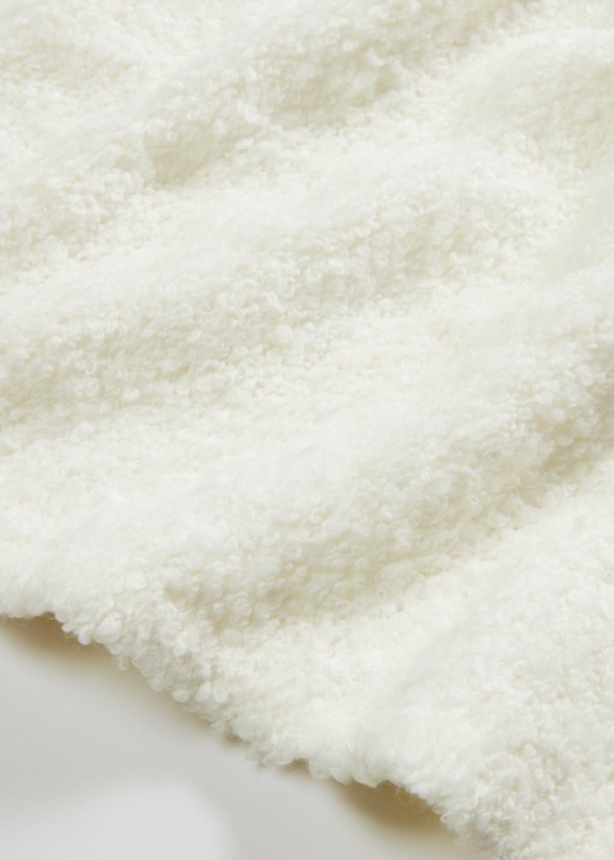 Pullover aus Bouclègarn mit ausgestellten Ärmel