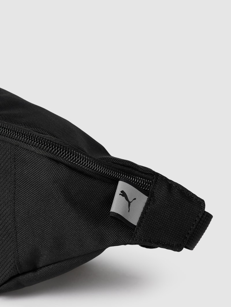 Bauchtasche mit Label-Detail Modell 'PUMA Deck Waist Bag' in schwarz