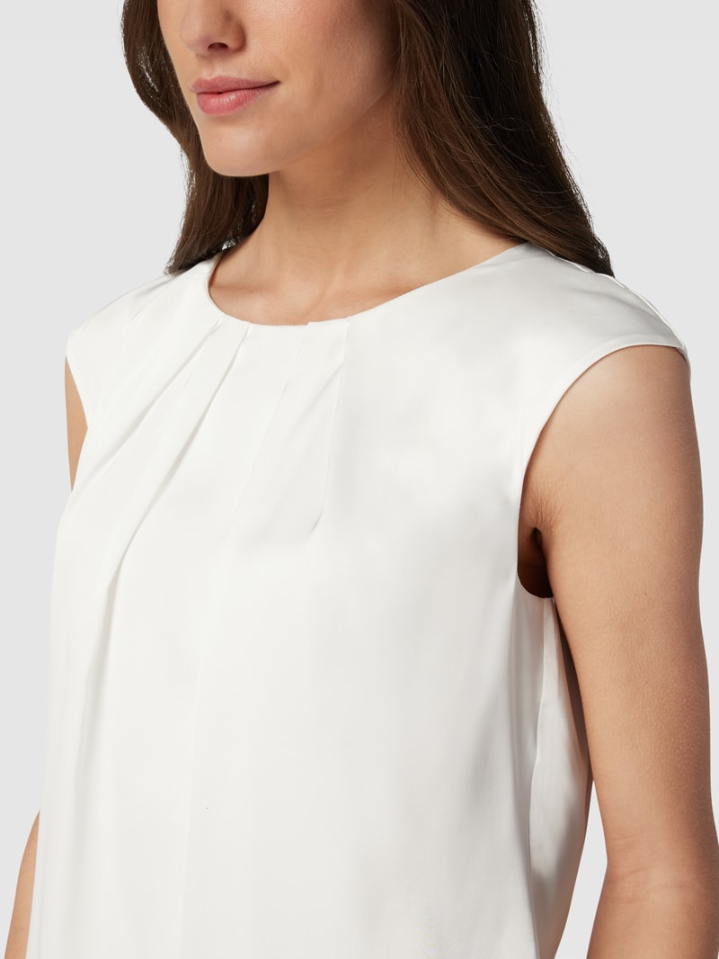 Bluse mit gelegten Falten in ecru
