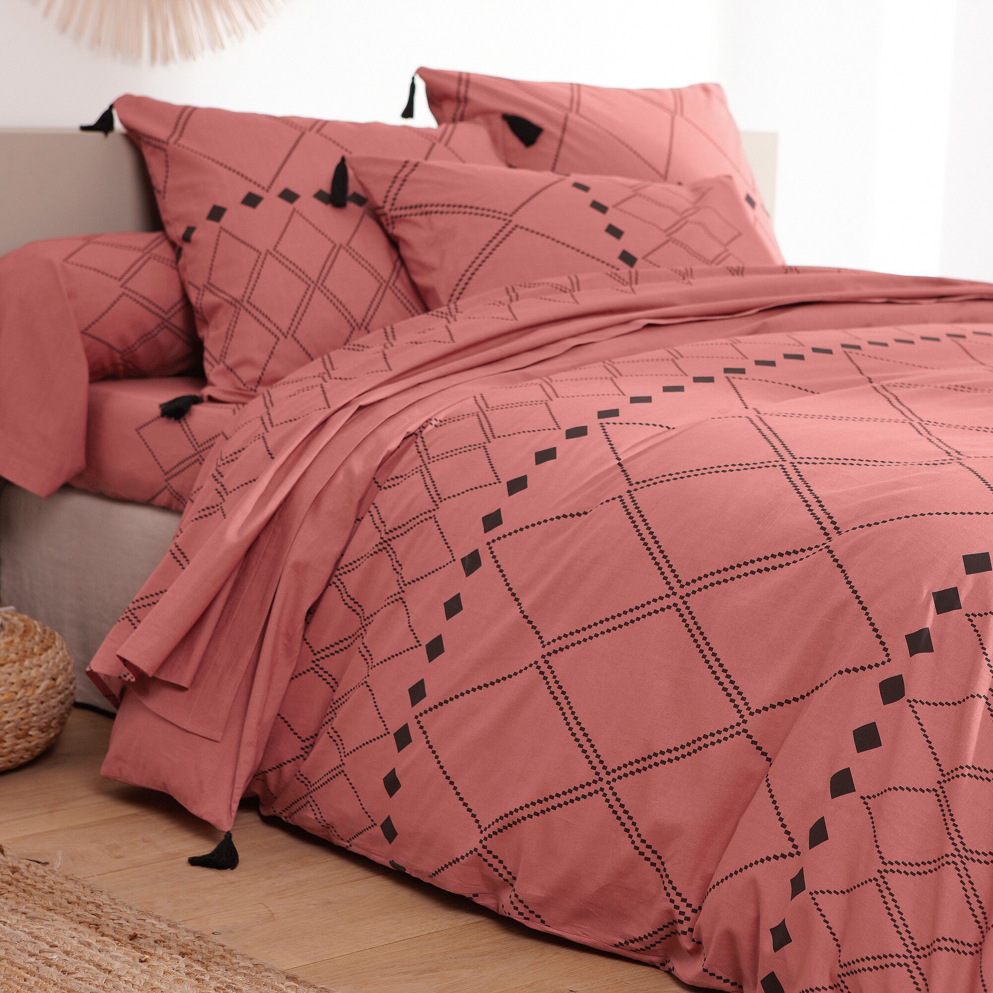 Linge de lit Massaï coton à motifs graphiques et finitions pompons