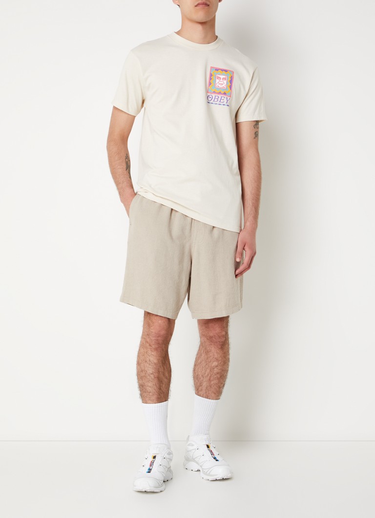 T-shirt Obey in stile retrò con logo e stampa sul retro.
