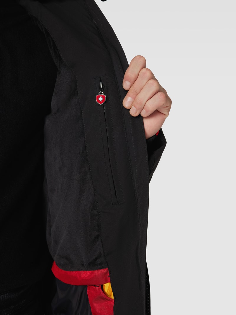 Funktionsjacke mit Reißverschlusstaschen und Storm Cuffs in schwarz