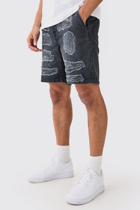 Reparierte Slim-Fit Jeansshorts in Schwarz