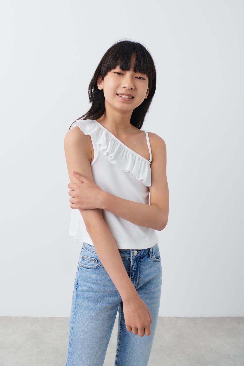 Y one shoulder flounce top