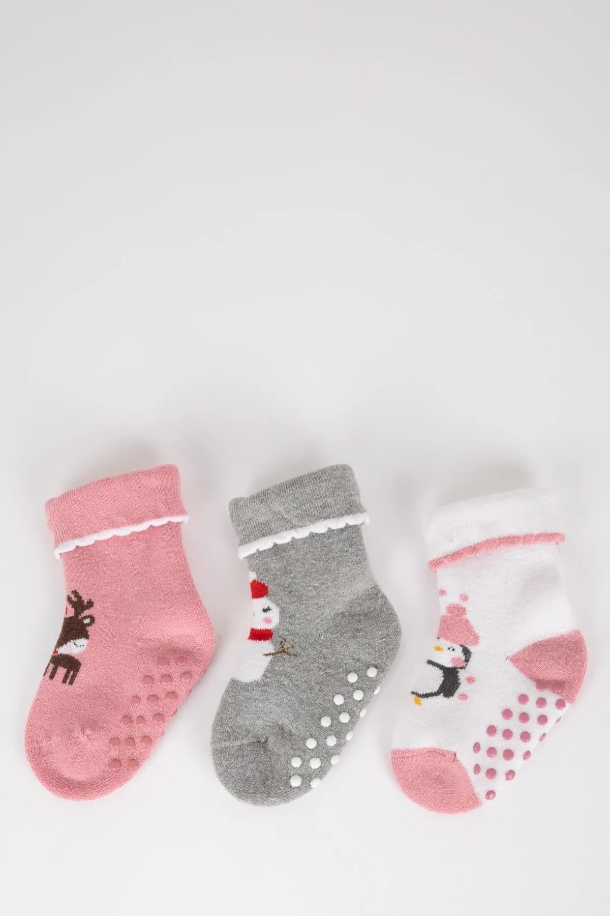 DeFacto  3-teiliges Set mit langen Baumwollsocken mit Weihnachtsmotiv und rutschfester Sohle für Babys und Mädchen Y7811a2ns