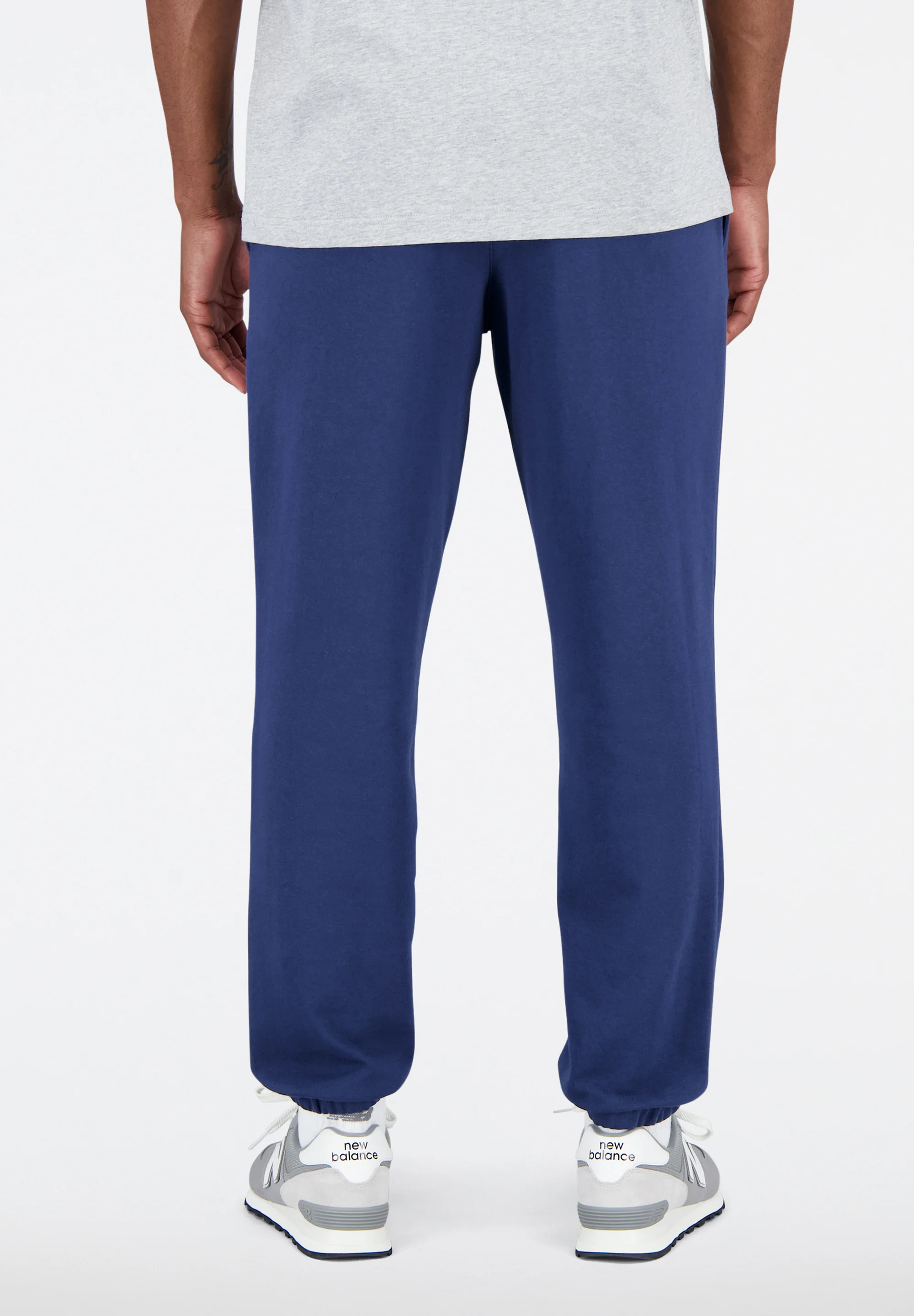 New Balance ESSENTIALS STACKED LOGO - Pantalones de chándal