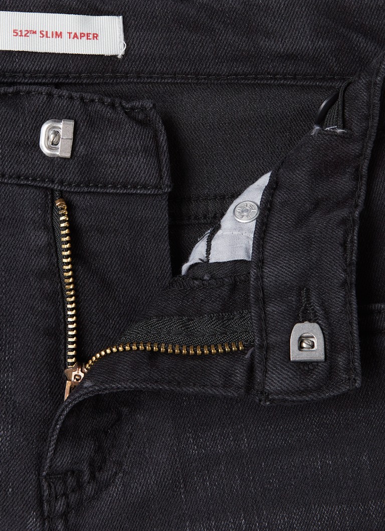 Blugi Levi's 512, mulați, colorați, cu talie elastică.