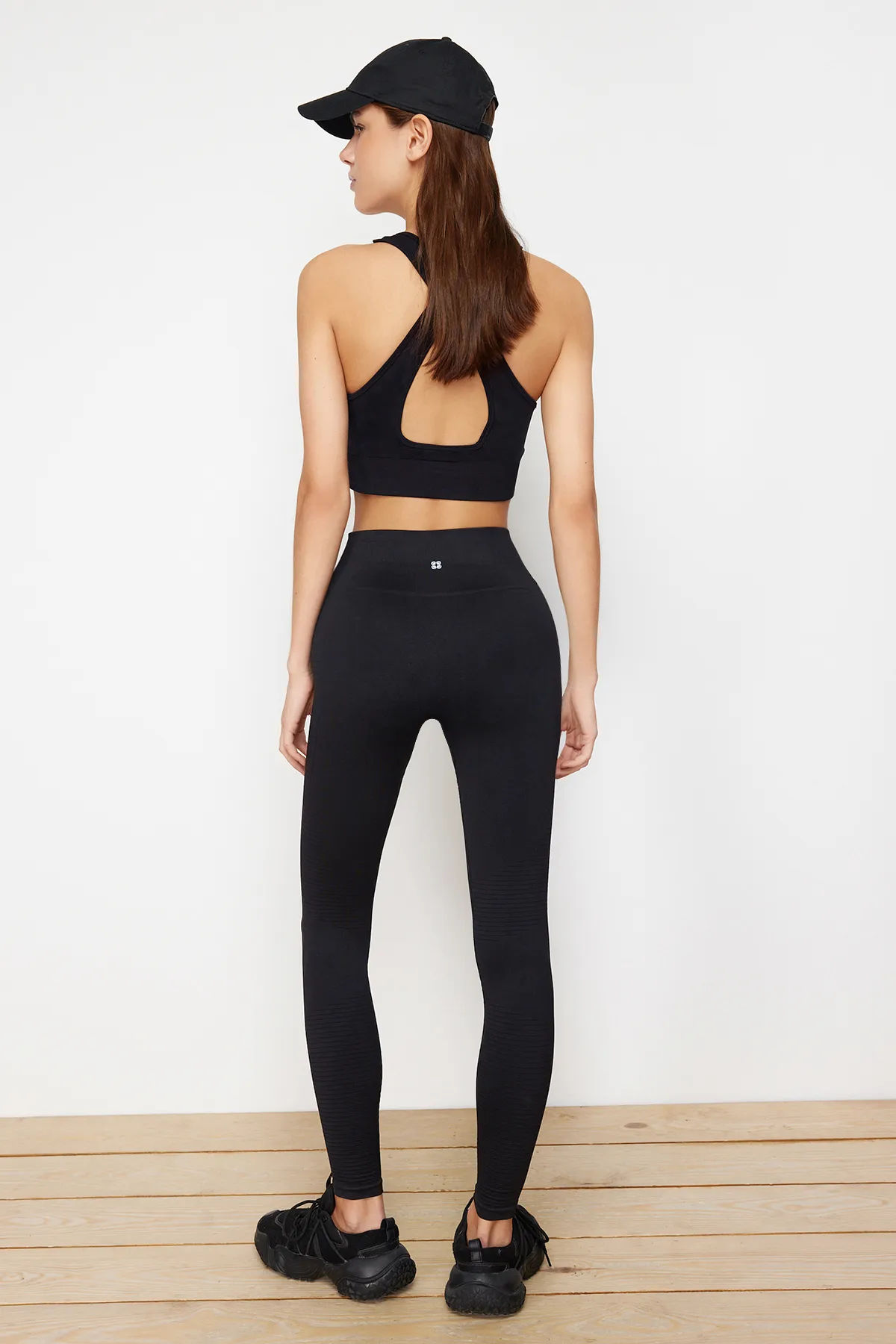 Trendyol Collection  Schwarze, nahtlos/nahtlos strukturierte, selbstgemusterte, gestrickte Sport-Leggings in voller Länge THMSS24TY00031