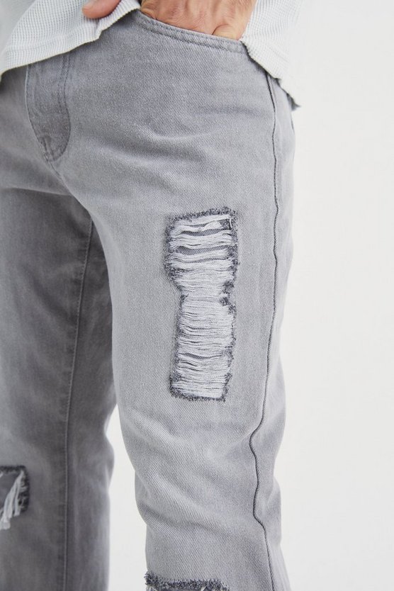 Slim-Fit Schlagjeans mit Rissen