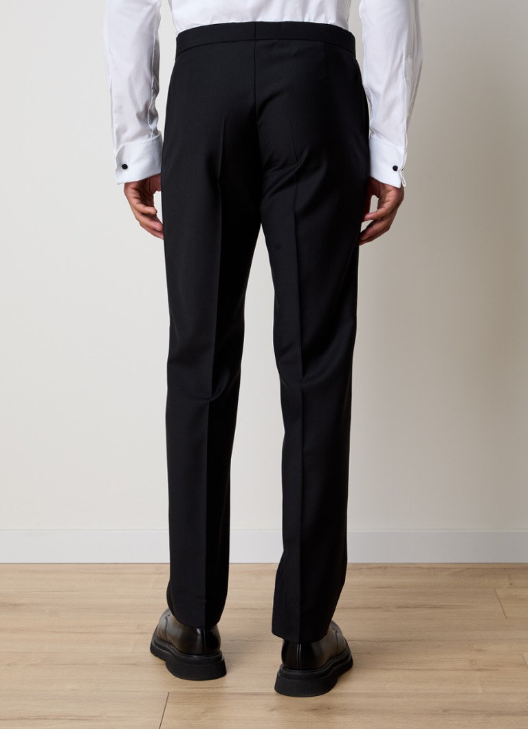 Pantaloni eleganți din lână Denz de la Oscar Jacobson, cu o croială rafinată și opțiune de călcare.