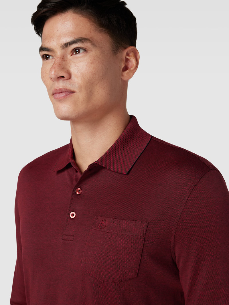 Poloshirt mit Brusttasche in rostrot