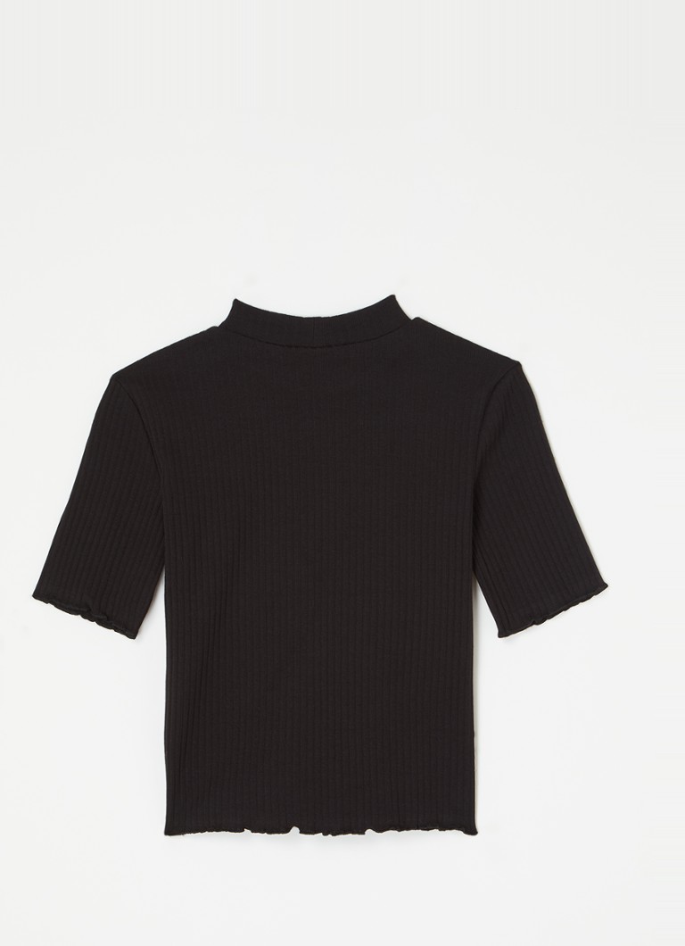 Blusa Benetton de malha canelada com mangas curtas.