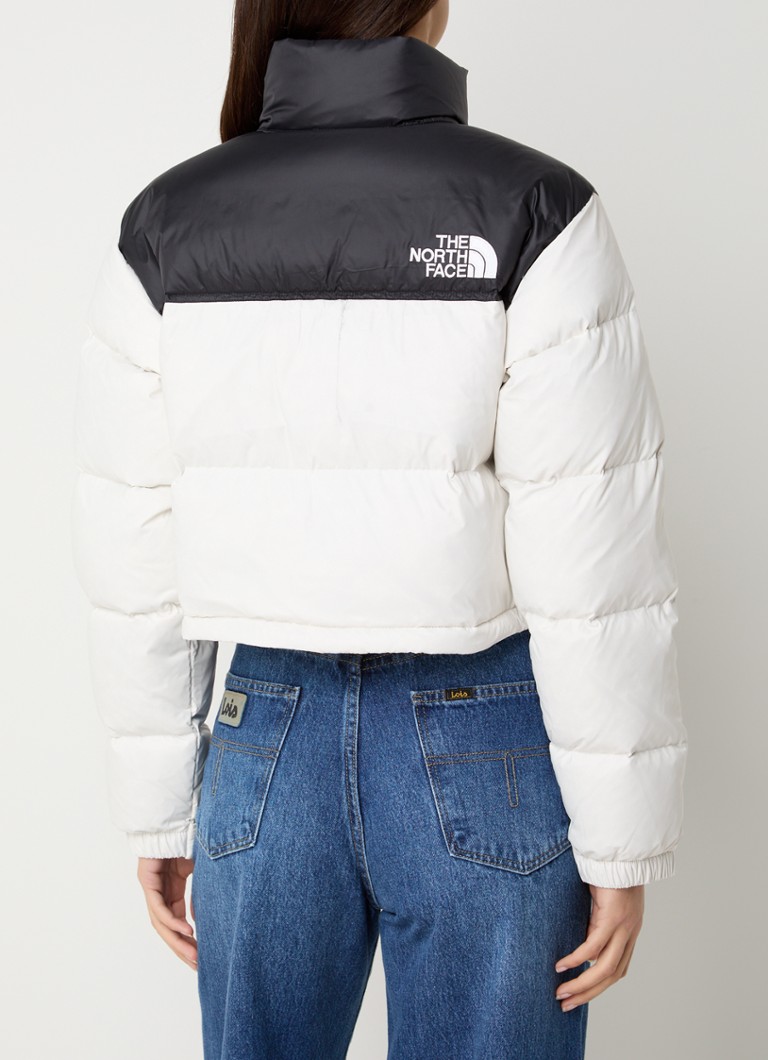 Jachetă din puf The North Face Nuptse cu izolație din puf și buzunare cu fermoar.