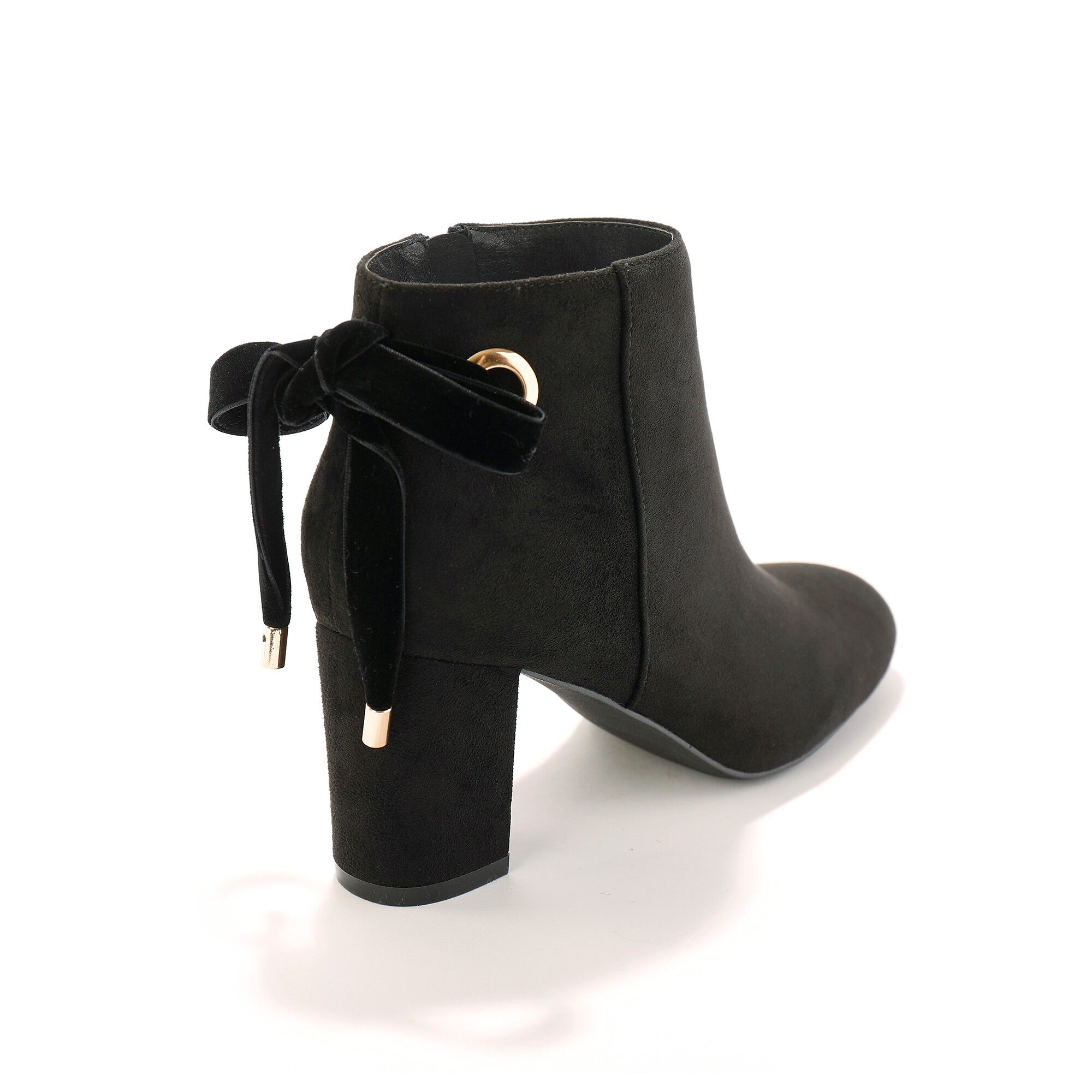 Boots à talon et noeud velours