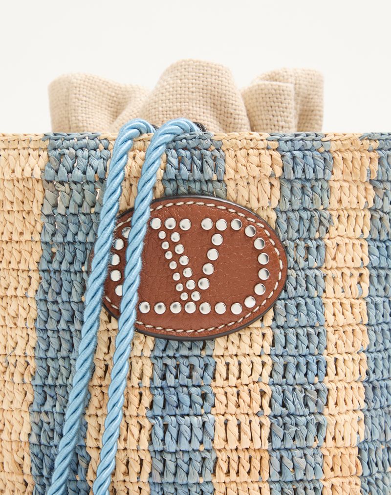 Valentino Garavani lille stribet raffia-buckettaske