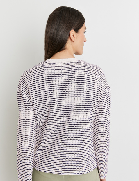 Modische Strickjacke mit dekorativer Blende