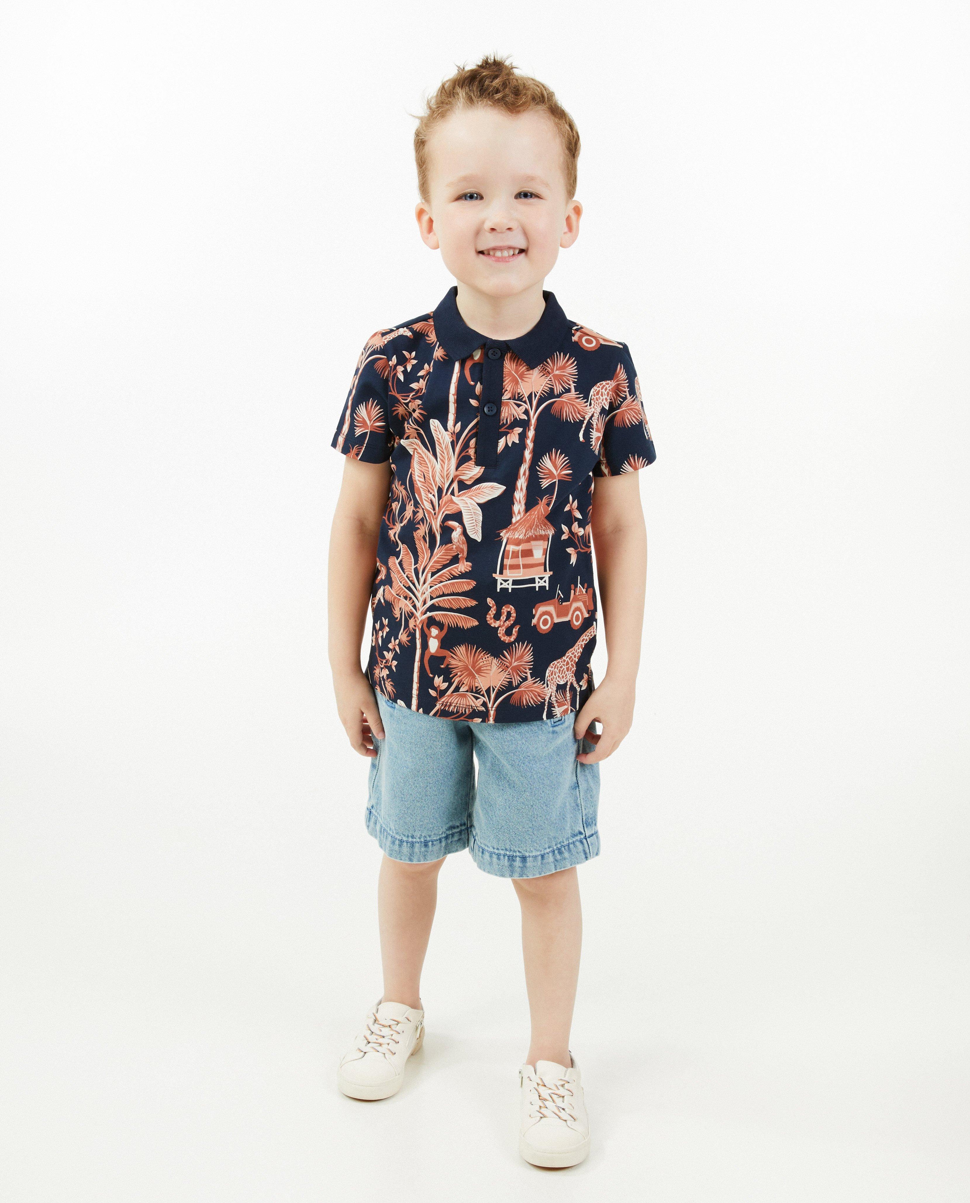Tricou polo Kidz Nation cu imprimeu tropical, 2-7 ani, albastru închis