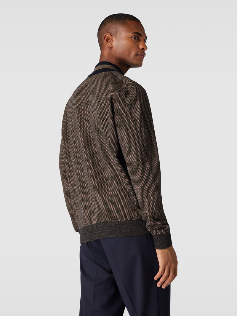 Sweatjacke mit Stehkragen und Reißverschlusstaschen in beige