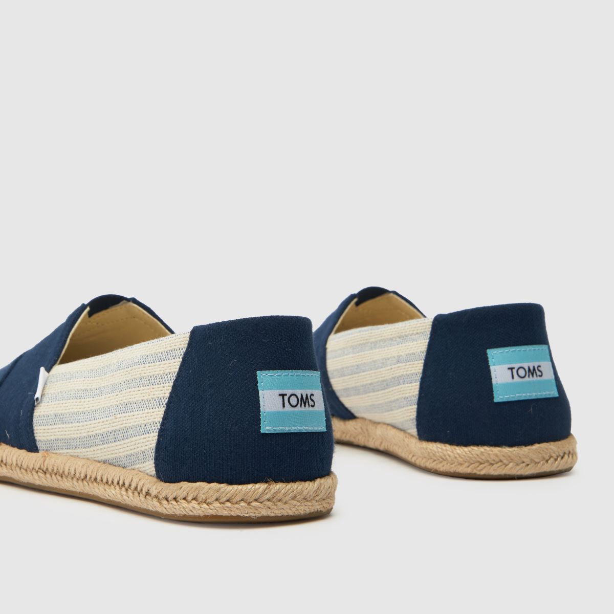 TOMS – Marinblå university – Randiga repskor
