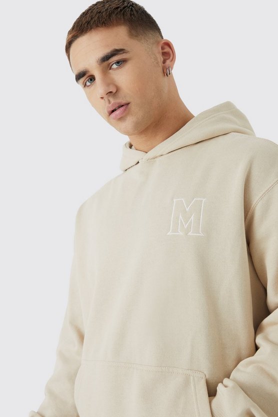 Oversize Hoodie mit M-Stickerei