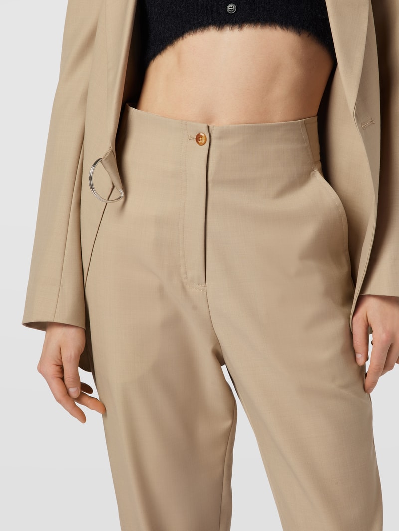 Hose mit französischen Eingrifftaschen in beige