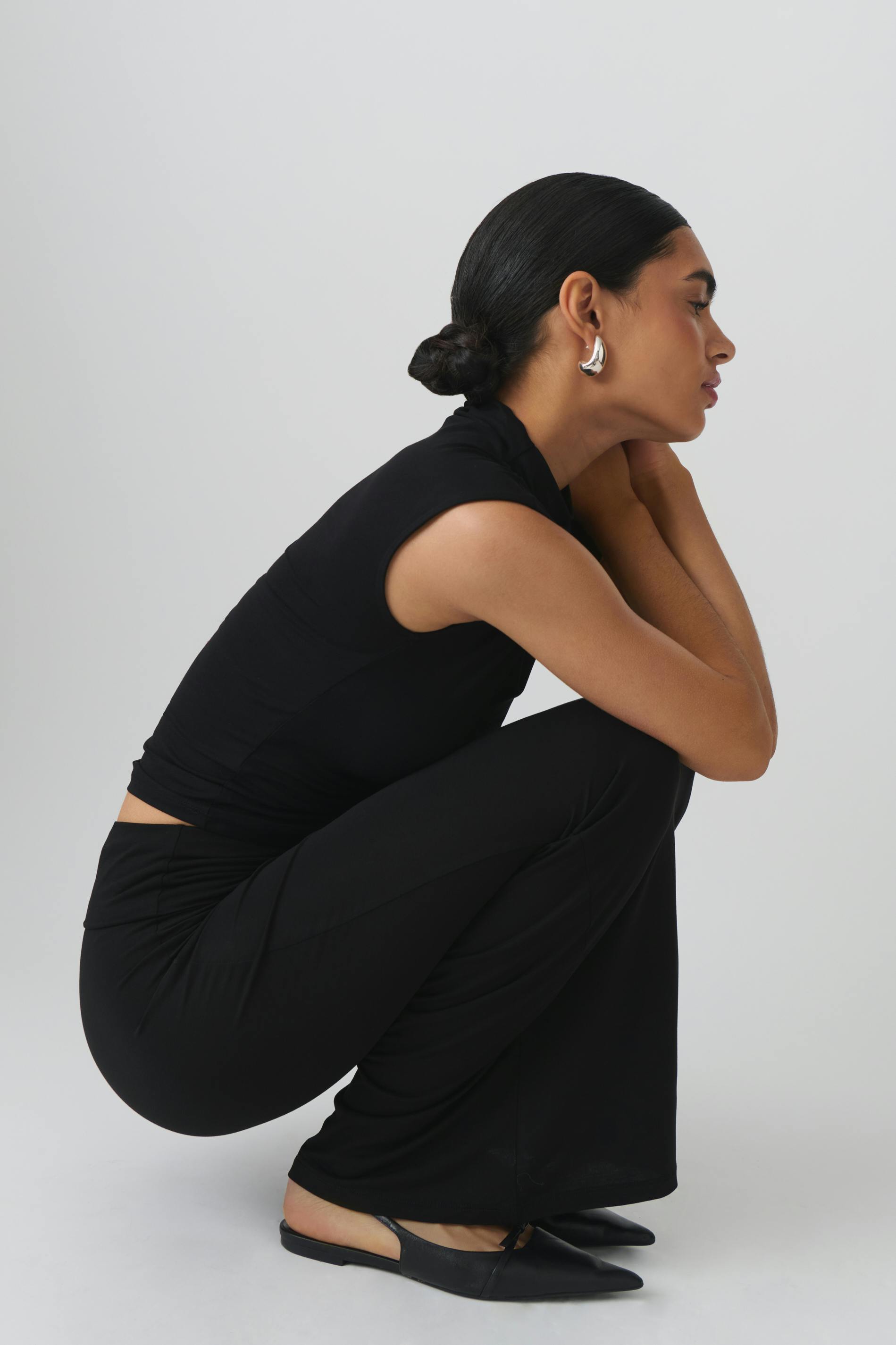 Soft touch funnel neck top