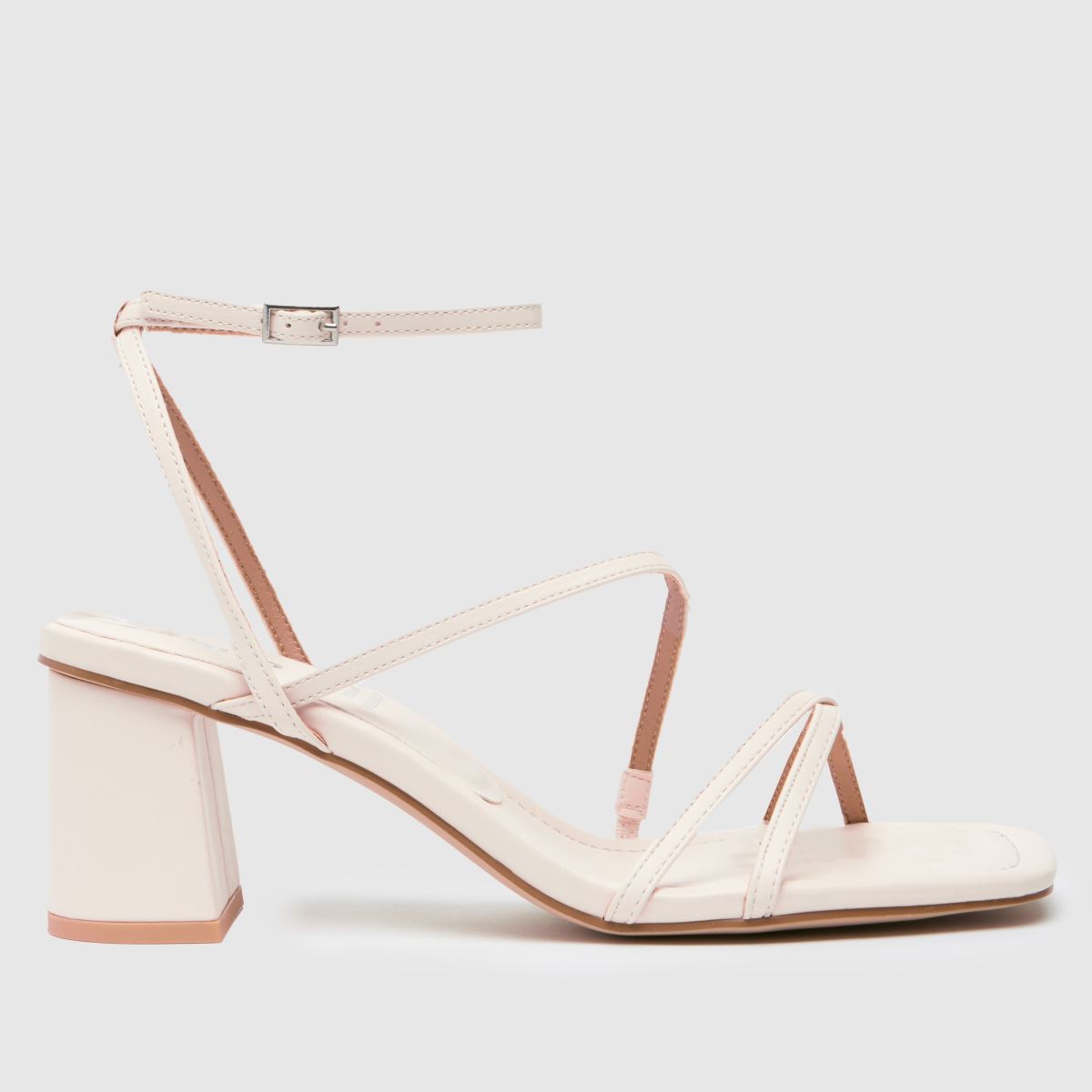 Schuh – Sully – Höga klackar med remmar i off-white