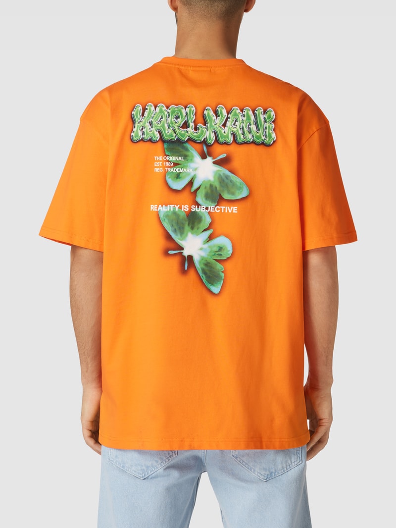 Oversized T-Shirt mit Label-Stitching - P&C X Karl Kani in dunkel orange