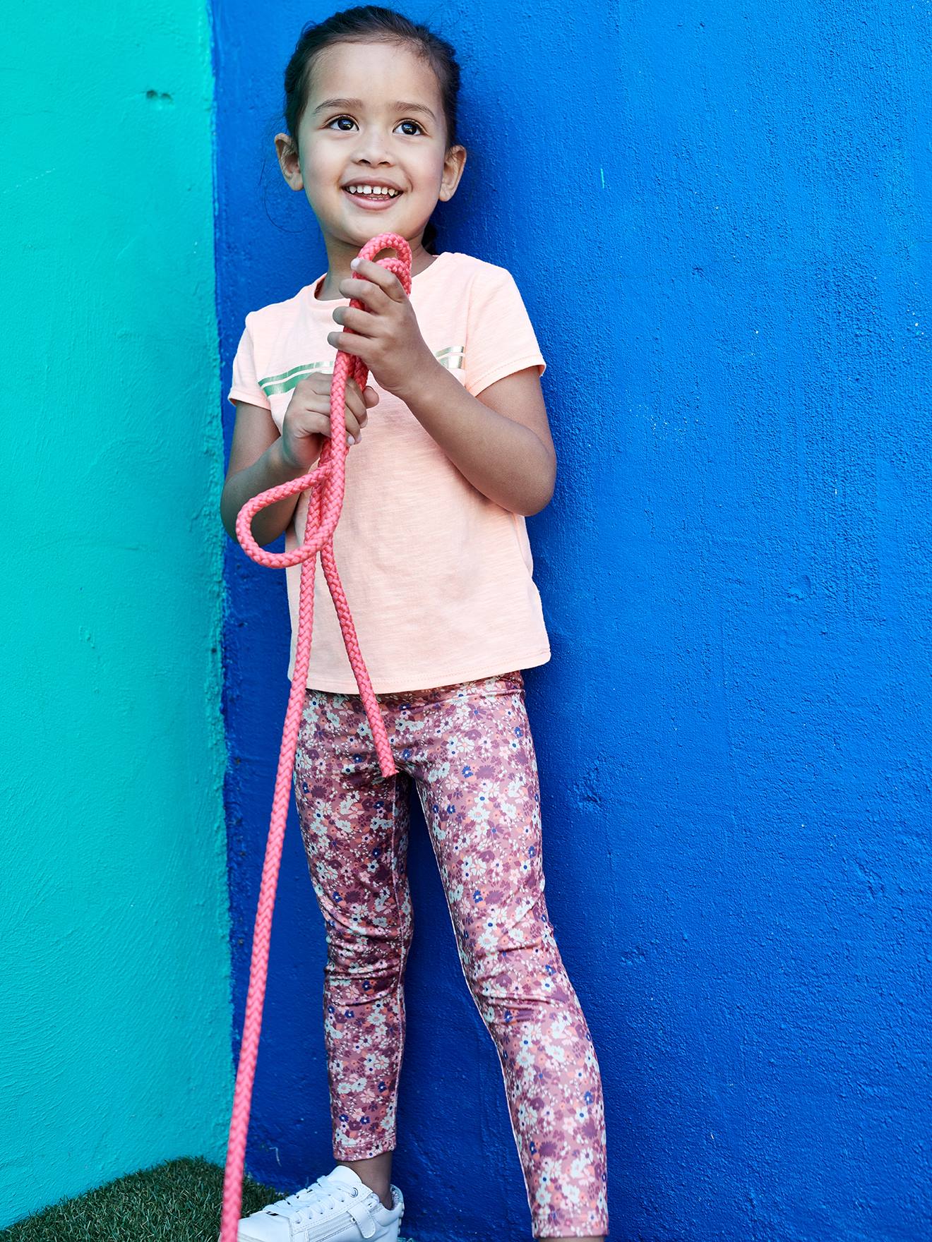 Legging sport imprimé en matière technique fille terracotta