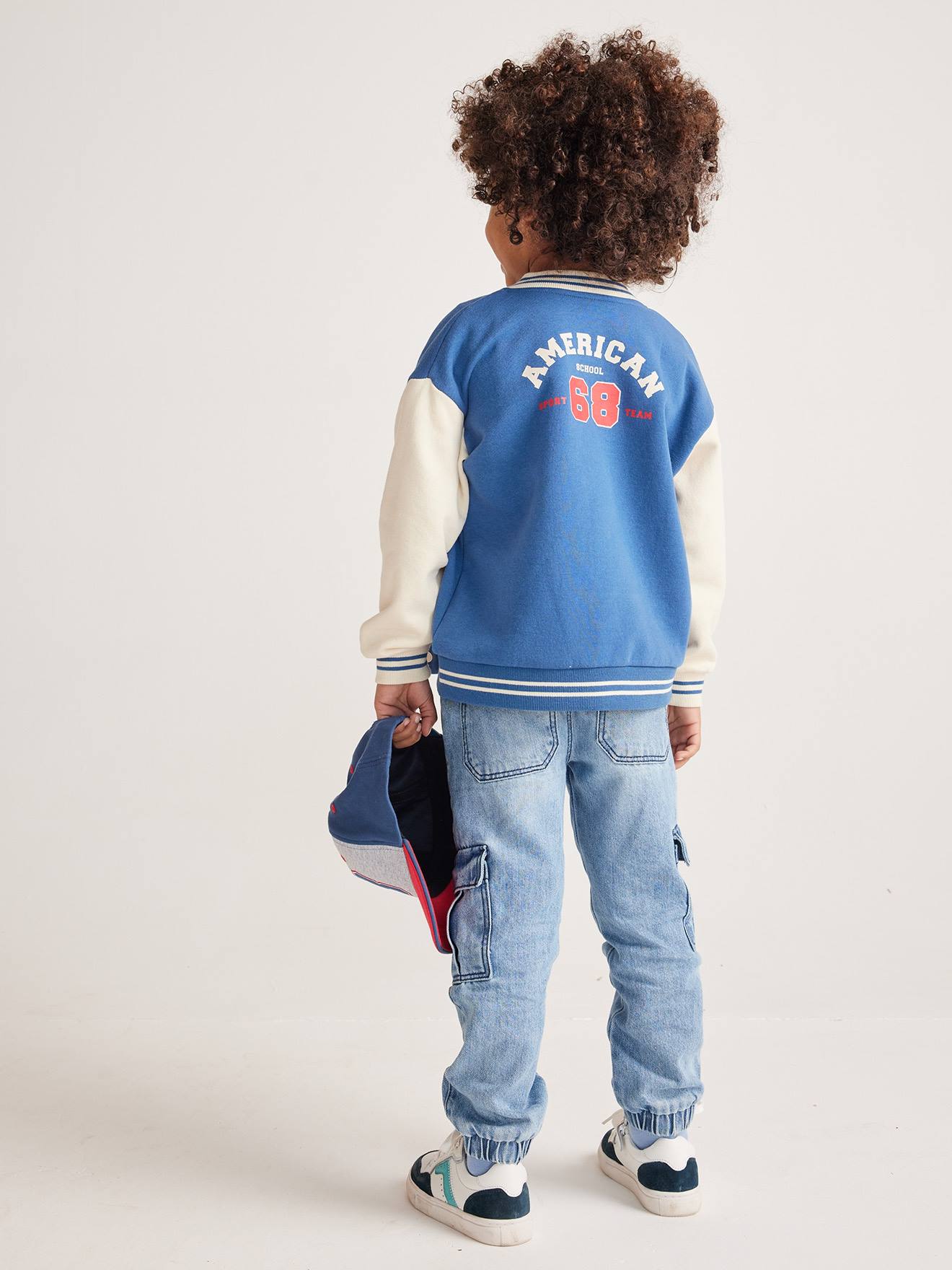 Sweat collège esprit teddy garçon pressionné devant bleu