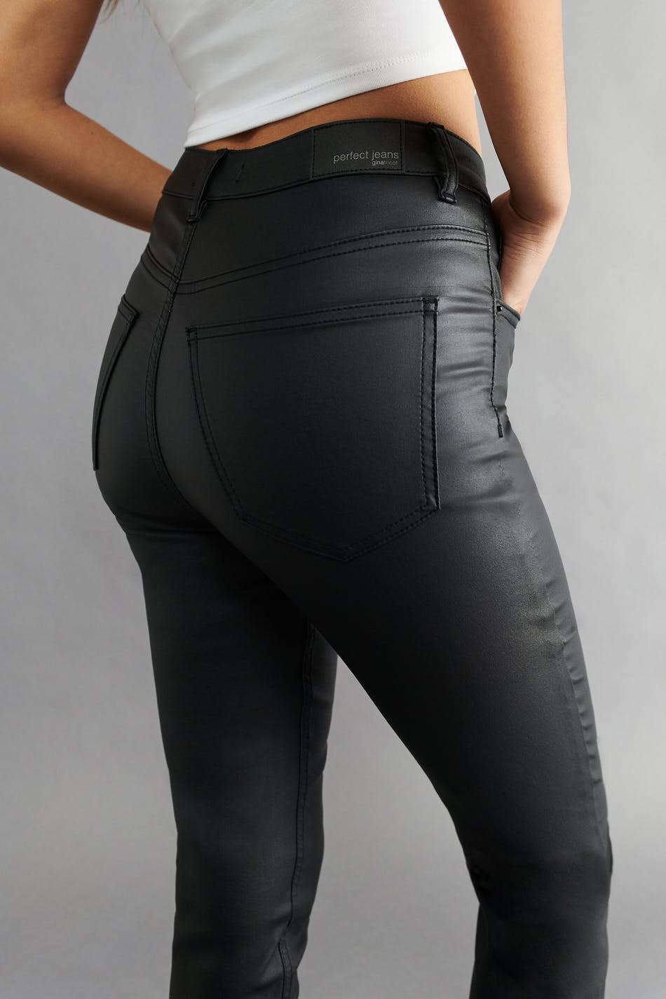 Coated bootcut jeans