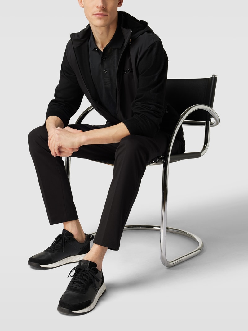Poloshirt mit Logo-Print in schwarz