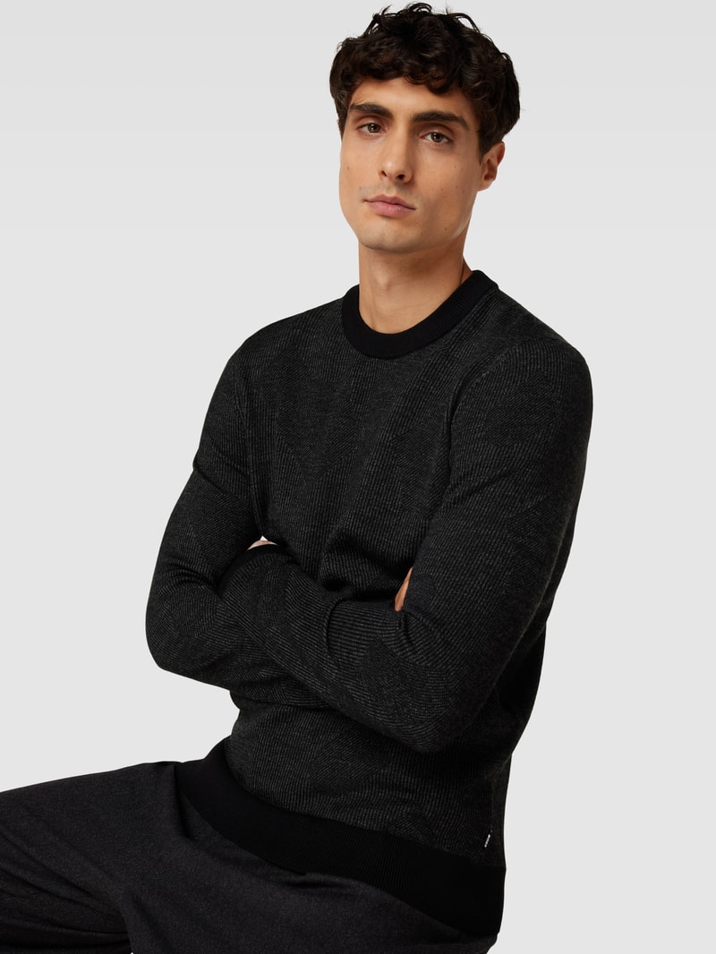 Strickpullover aus Schurwolle Modell 'Motivo' in schwarz