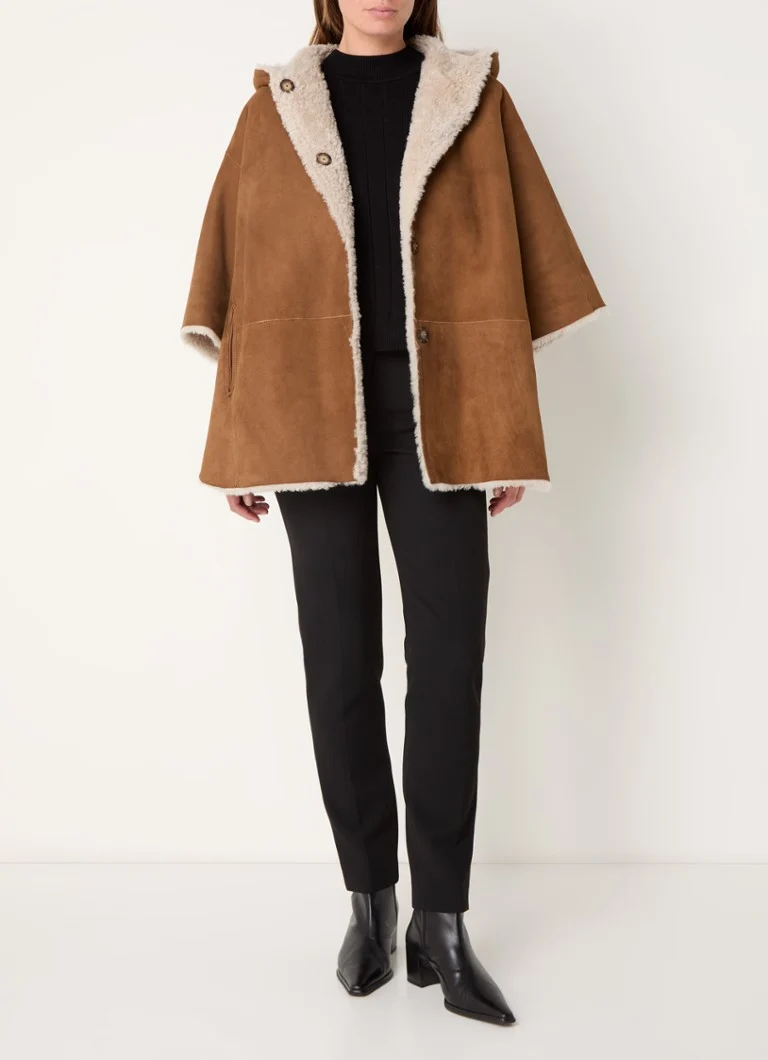 Gerard Darel Loriane vendbar saueskinnsponcho med hette