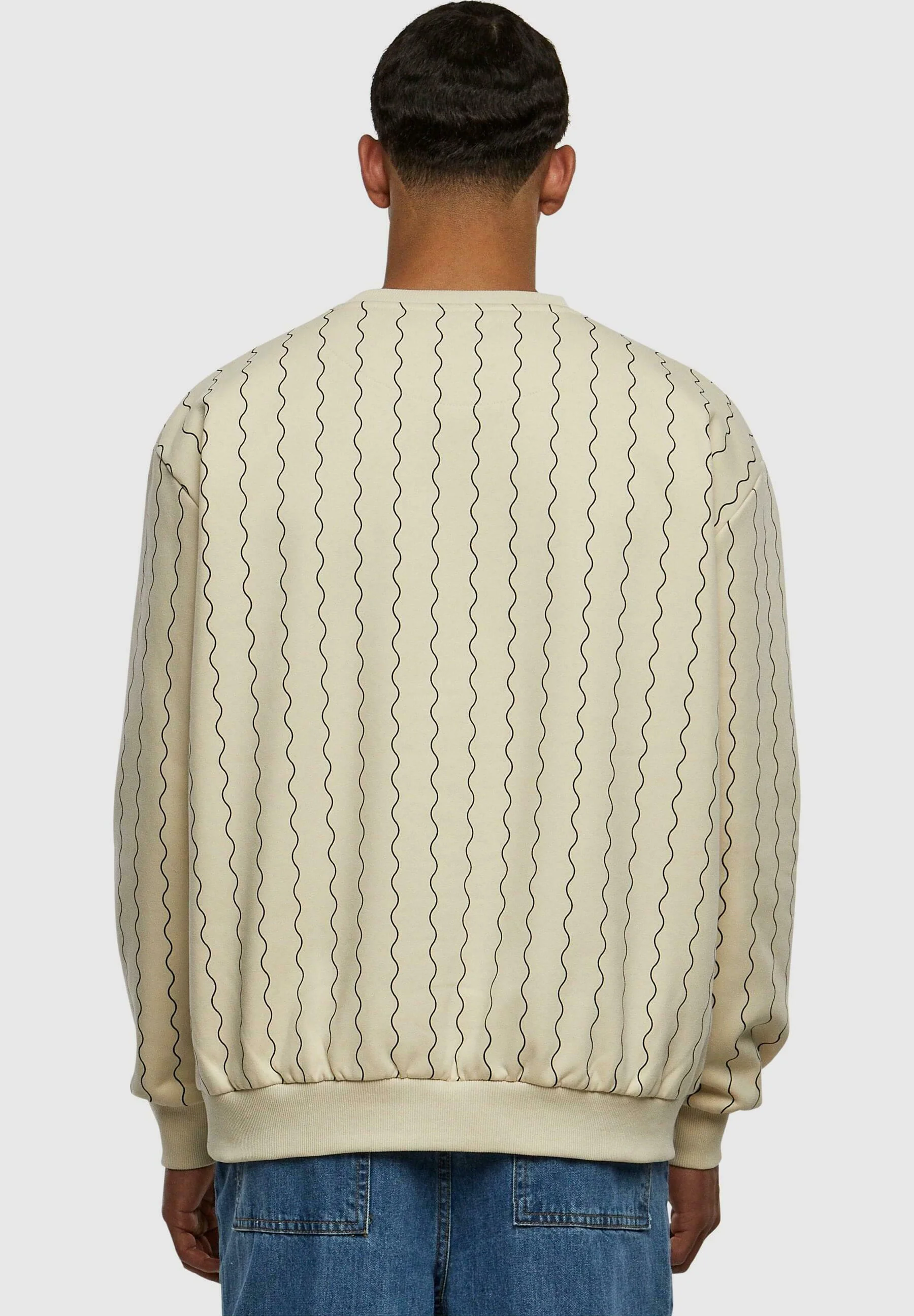 Sudadera Karl Kani con cuello redondo, rayas ziczac y firma pequeña