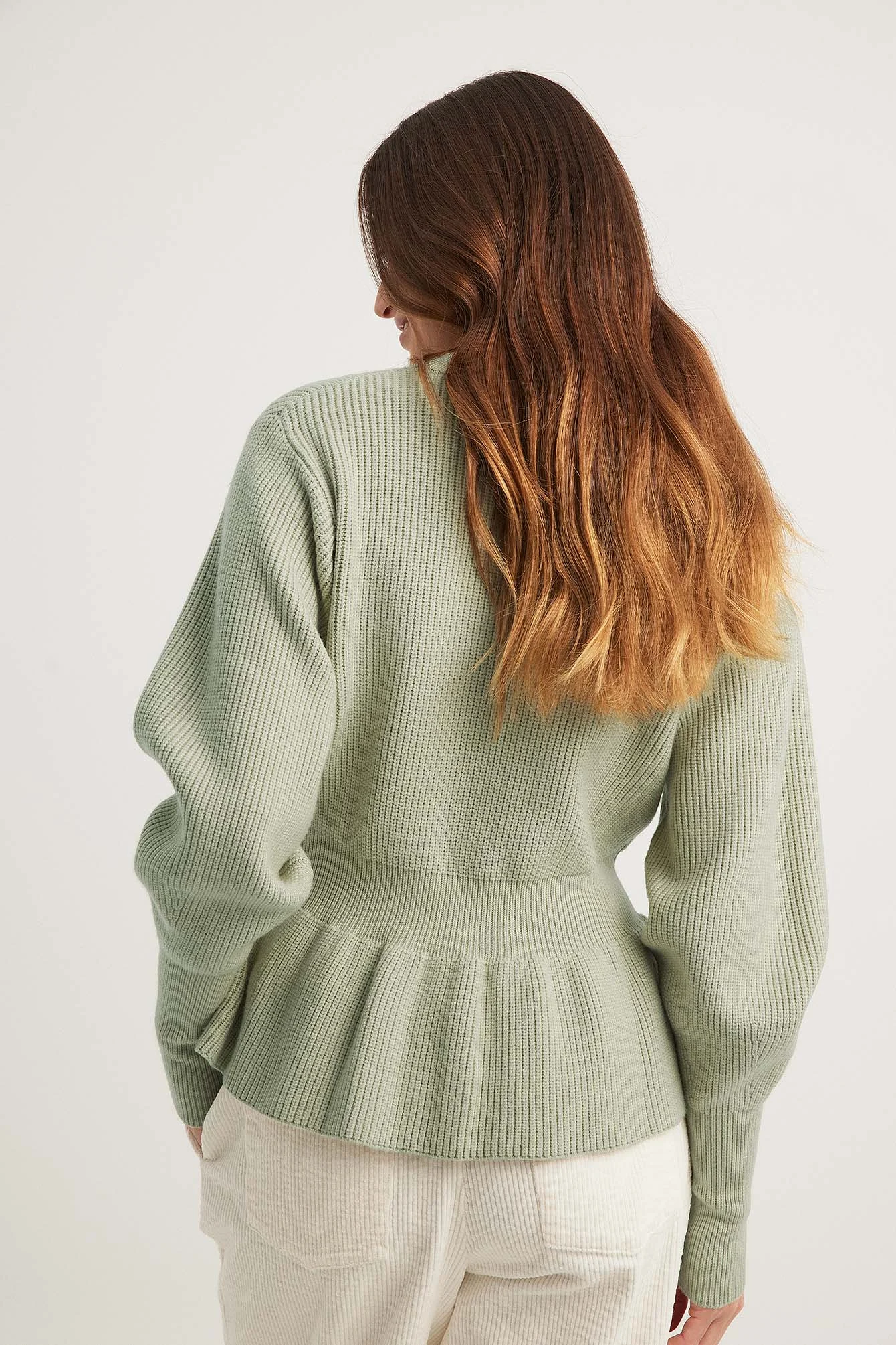 Strickpullover mit Schößchen