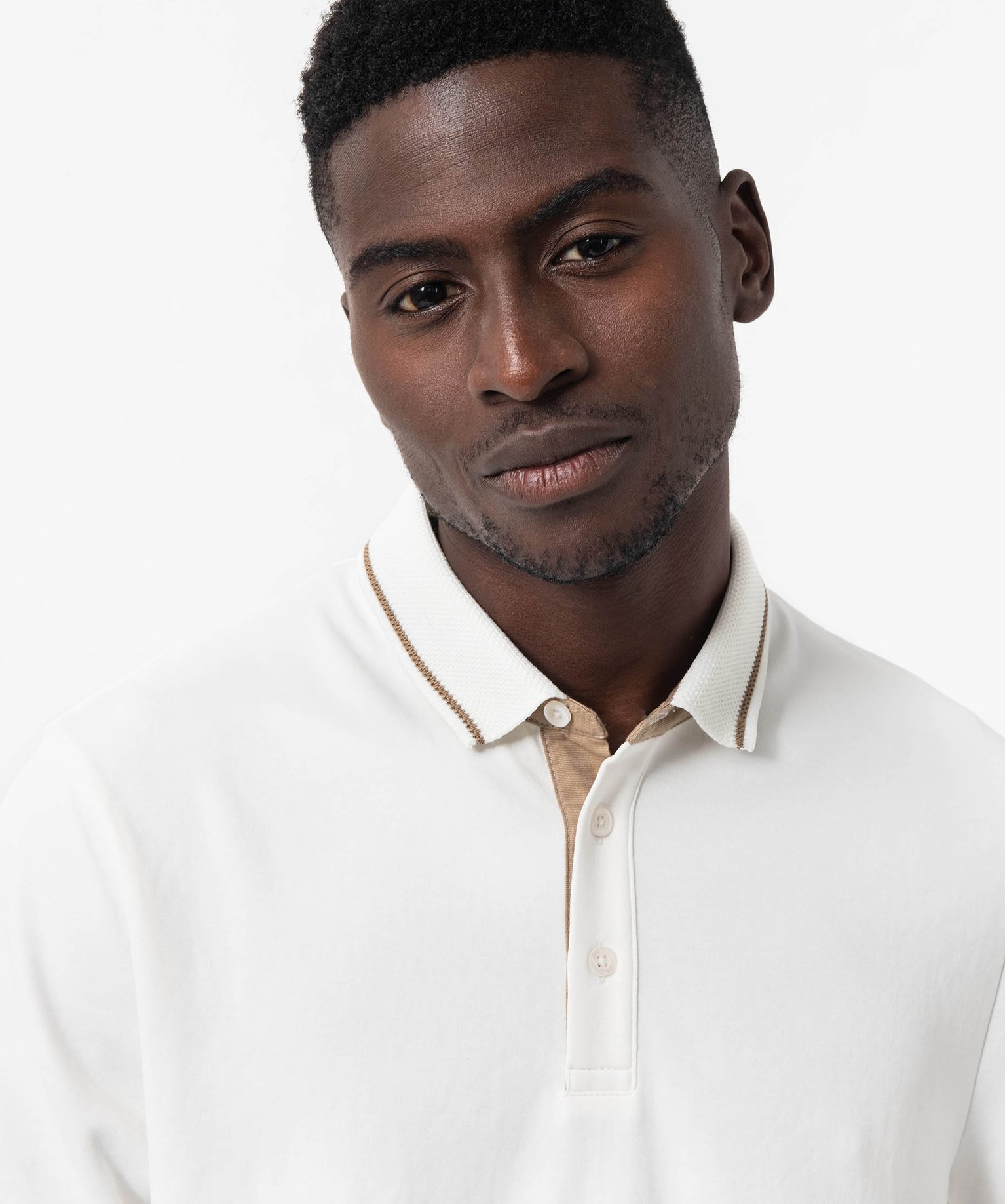 Polo à manches courtes en maille extensible homme blanc | GEMO