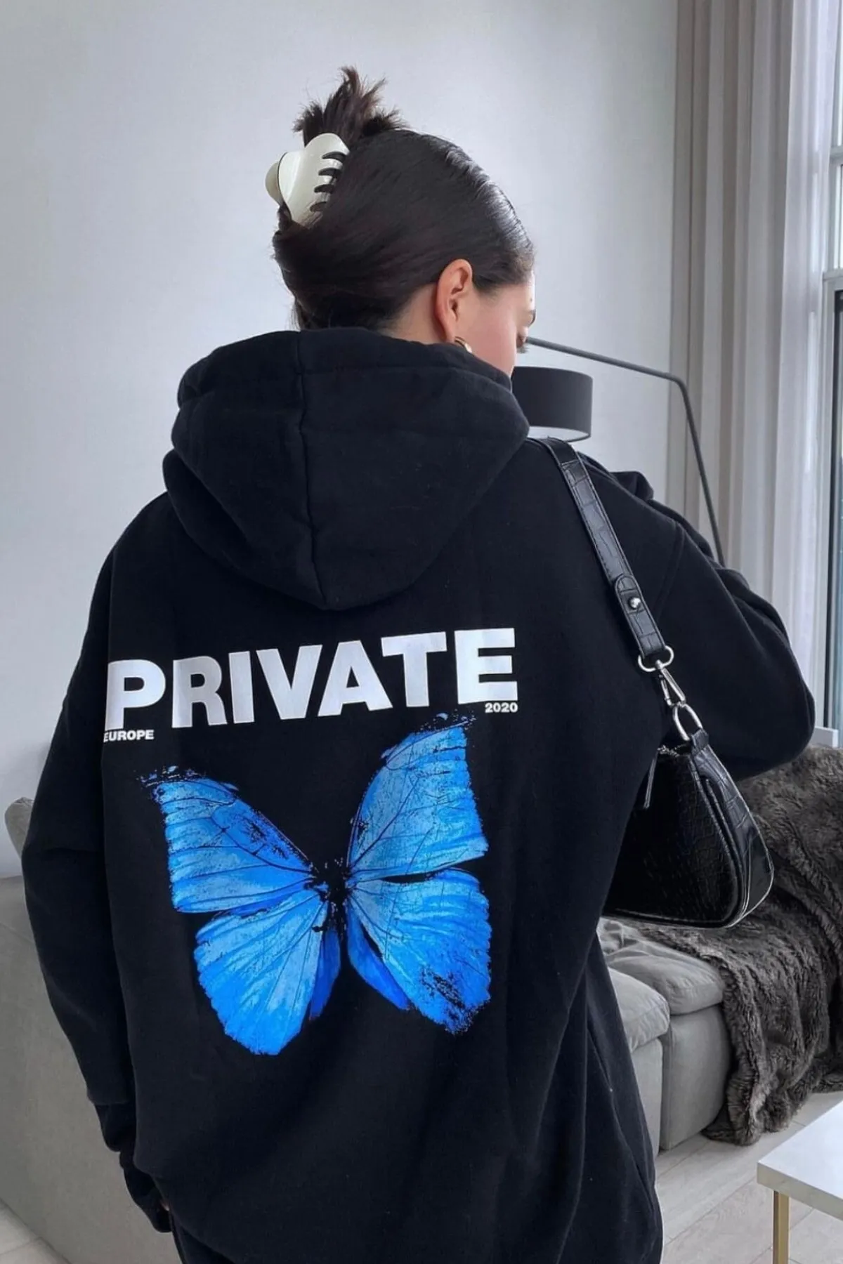 MODAGEN  Schwarzes, übergroßes Kapuzen-Sweatshirt mit Private-Back-Print für Damen