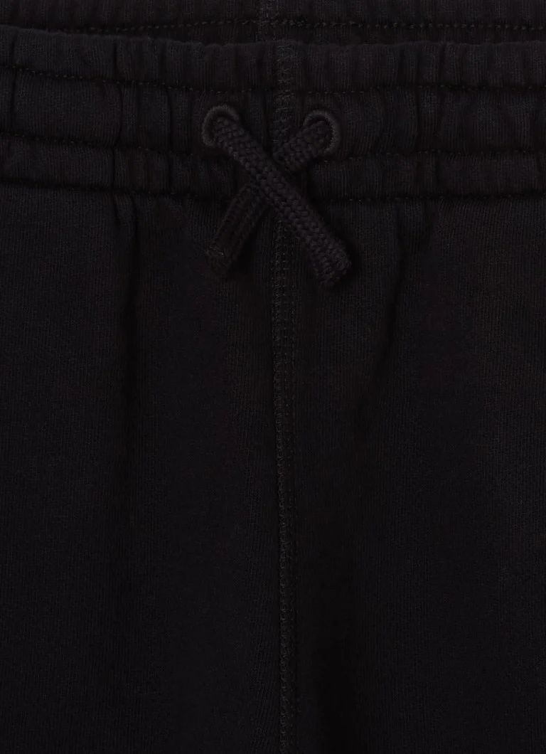 Baltas, grāmatu stila, taisnas piegriezuma sporta bikses ar logotipa joslu
