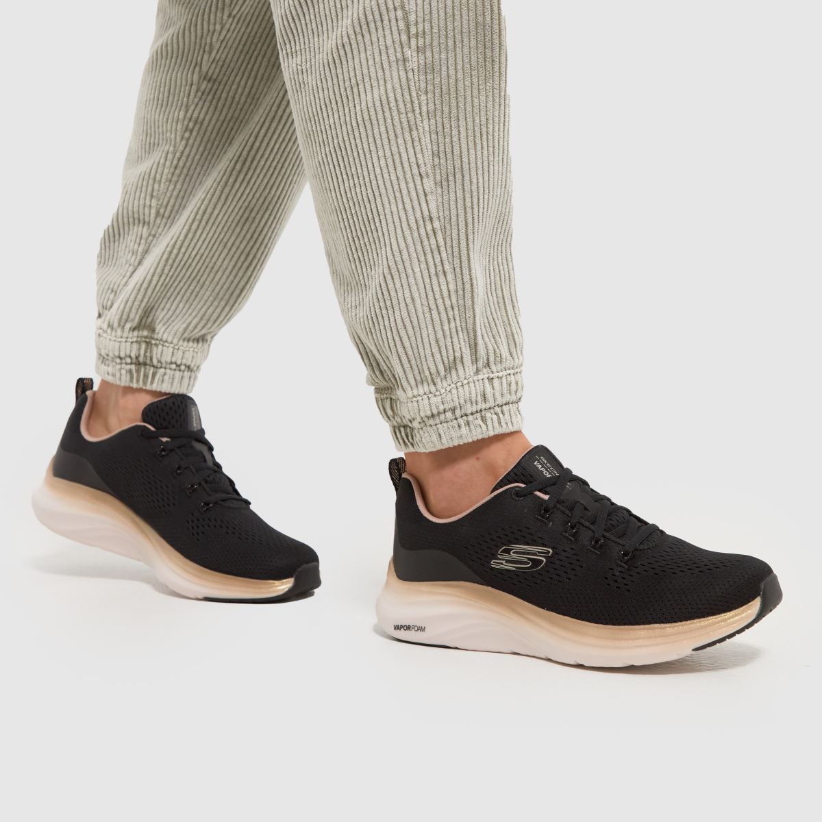 SKECHERS – Svarta, flerfärgade sneakers med ångskum