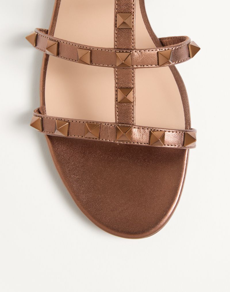 Rockstud lage teenslipper van gelamineerd nappaleer