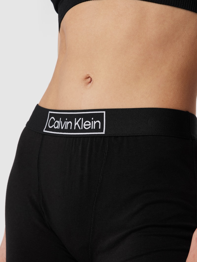 Pyjama-Hose mit Label-Schriftzug in schwarz