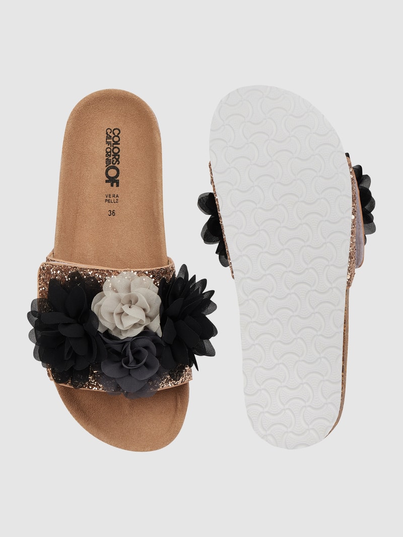 Pantolette mit Blüten-Applikationen in schwarz