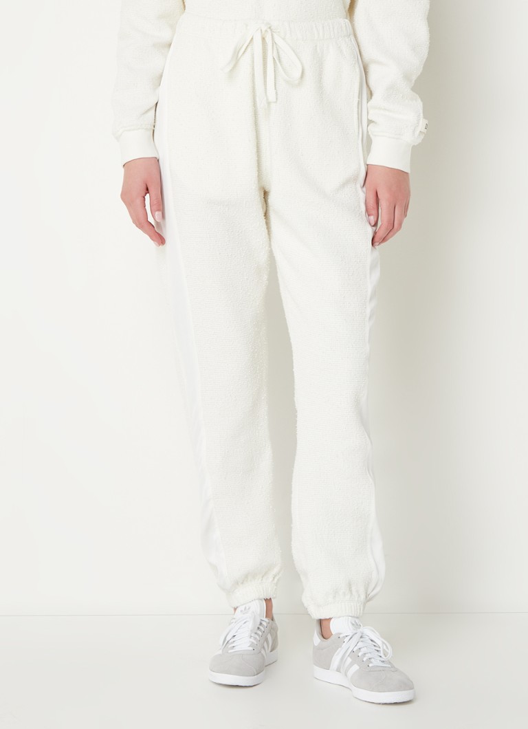 Pantaloni sportivi a vita alta e affusolati di 10DAYS in cotone biologico testurizzato.