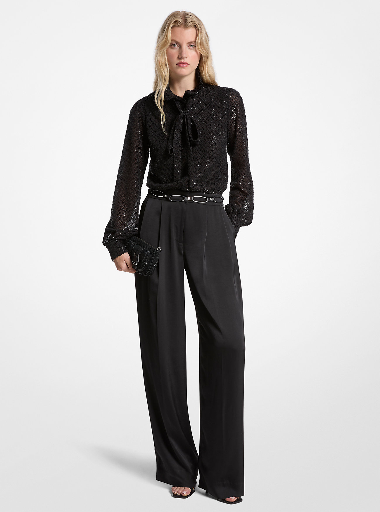 Tuta intera in jacquard con clip metalliche e raso con fiocco al collo - NERA