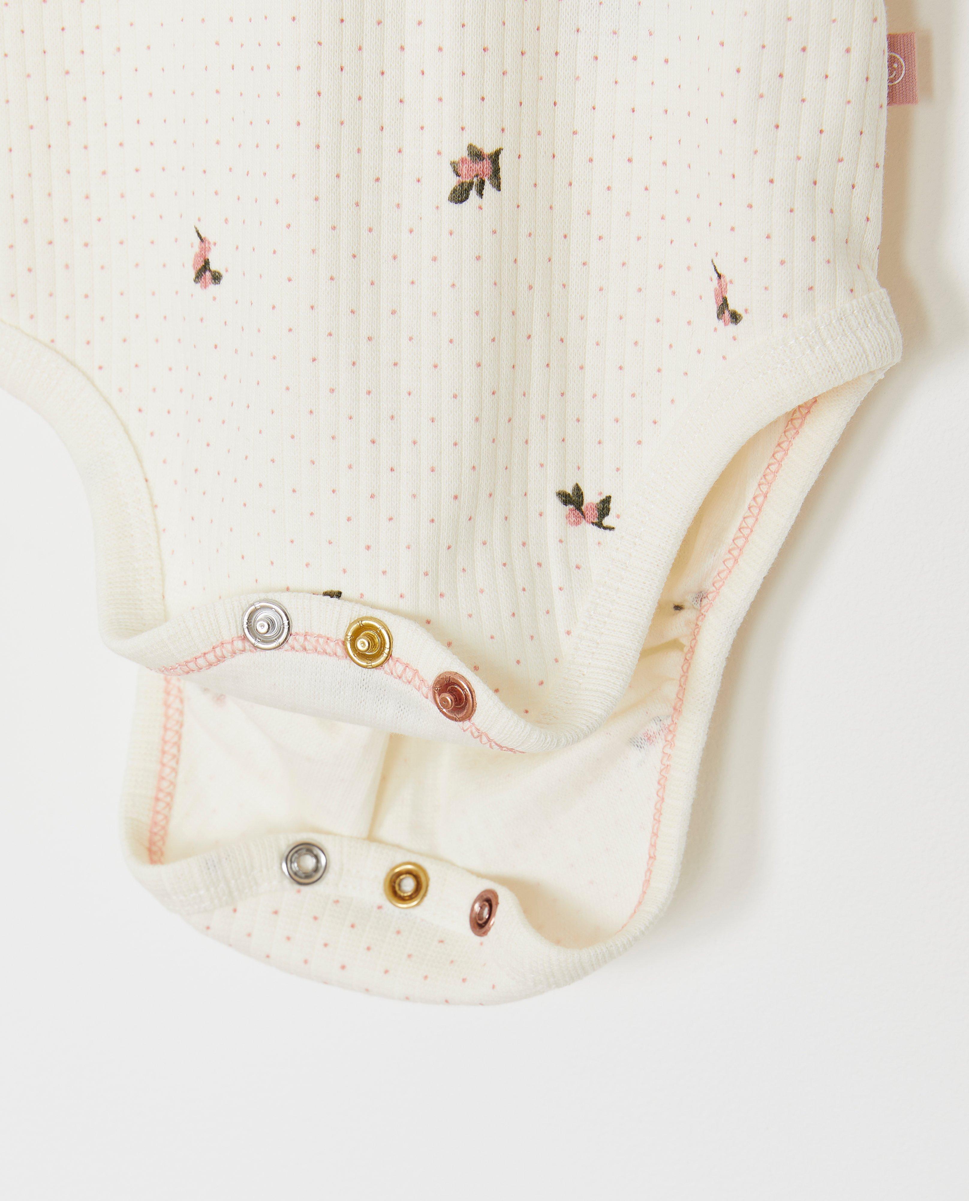 Cuddles and Smiles Romper med kuvertficka