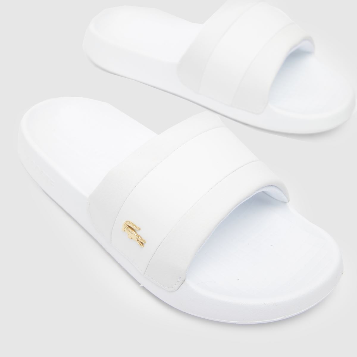 Lacoste – Serve – Vita hybridsandaler med tofs